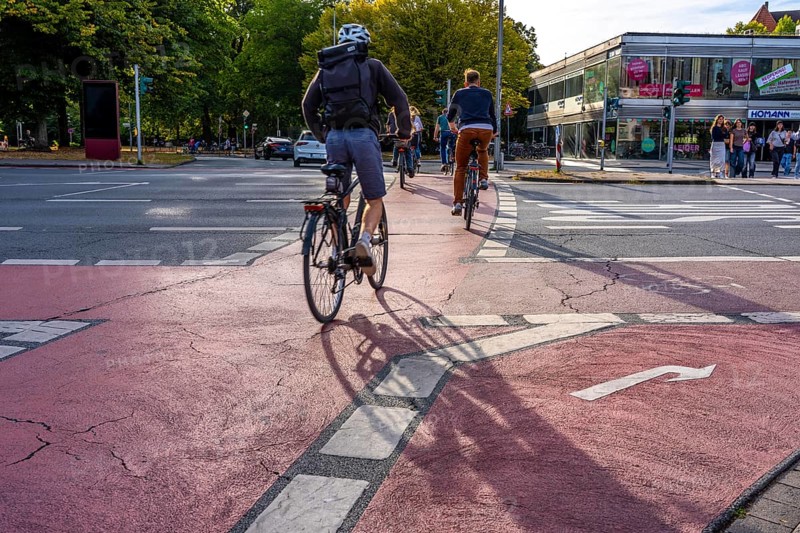 Cycle traffic in Münster, cycle path on Wolbecker Straße, tunnel under the tracks at the main railway station, cycle path red asphalt, marked, city centre of Münster, dense cycle traffic, North Rhine-Westphalia, Germany