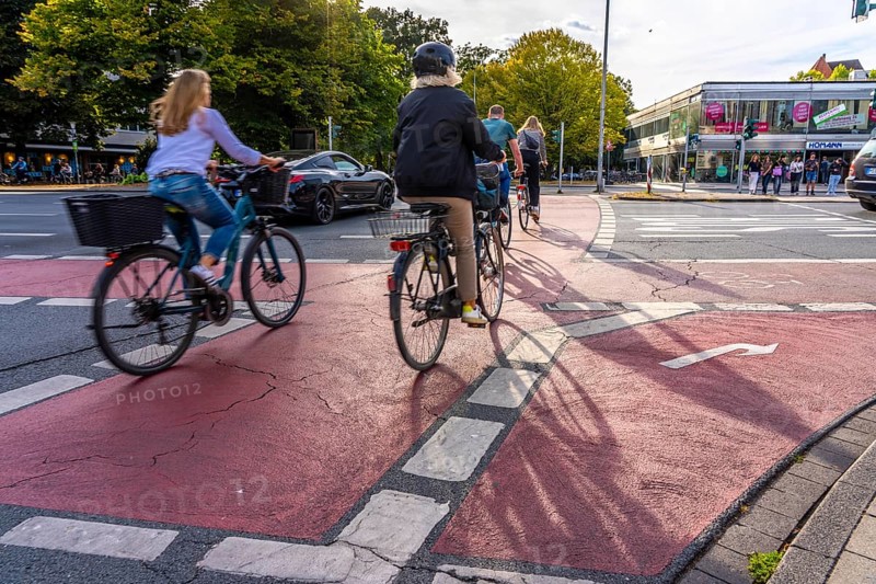 Cycle traffic in Münster, cycle path on Wolbecker Straße, tunnel under the tracks at the main railway station, cycle path red asphalt, marked, city centre of Münster, dense cycle traffic, North Rhine-Westphalia, Germany