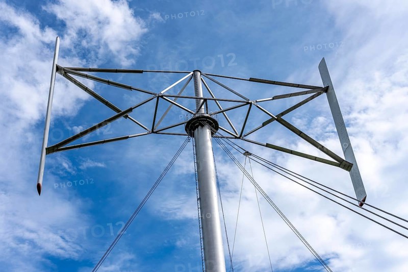 Vertical axis wind turbine, Darrieu wind turbine, 2 vertically mounted rotors rotate around the axis, near Darup in Münsterland, North Rhine-Westphalia, Germany