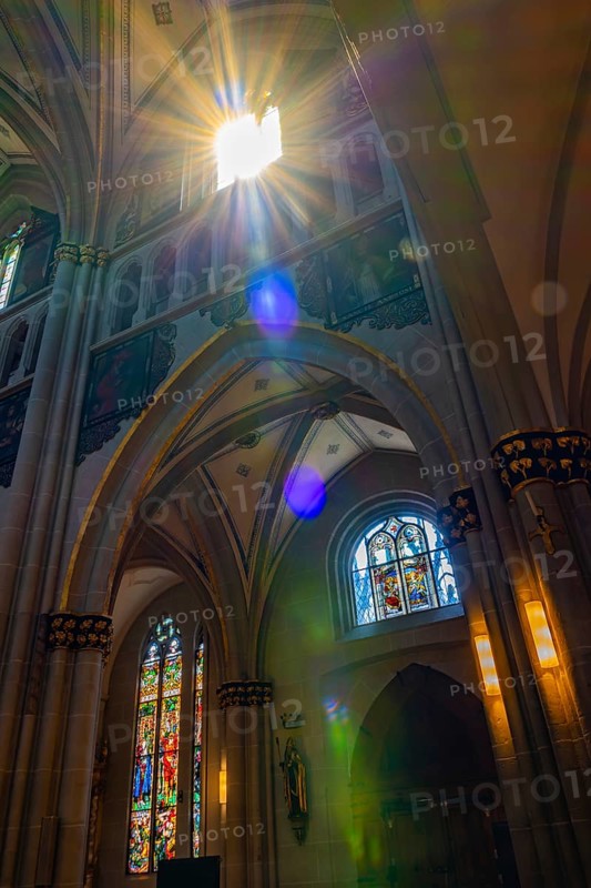 Sunbeam Inside the Cathedral in Old Town Medieval in a Sunny Summer Day in Fribourg, Canton Fribourg, Switzerland