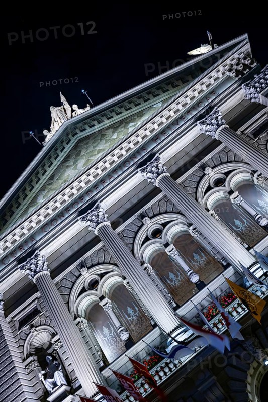 Beautiful Bundeshaus Illuminated Parliament Building or Federal Palace with Statue at Night in City of Bern, Bern Canton, Switzerland