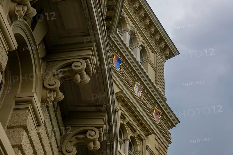 Beautiful Bundeshaus Parliament Building or Federal Palace with Canton Shield and Storm Clouds in City of Bern, Canton Bern, Switzerland