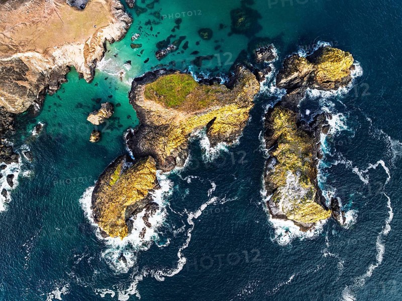 Top Down view over Kynance Cove from a drone, Mount's Bay, Lizard Point, Cornwall, England, United Kingdom