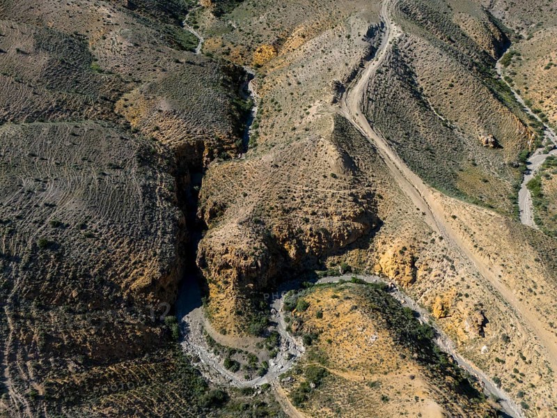 View of hilly landscape with clearly visible unpaved roads, aerial view, Angel's Canyon, canyon, Dashtakar, Ararat Province, Armenia