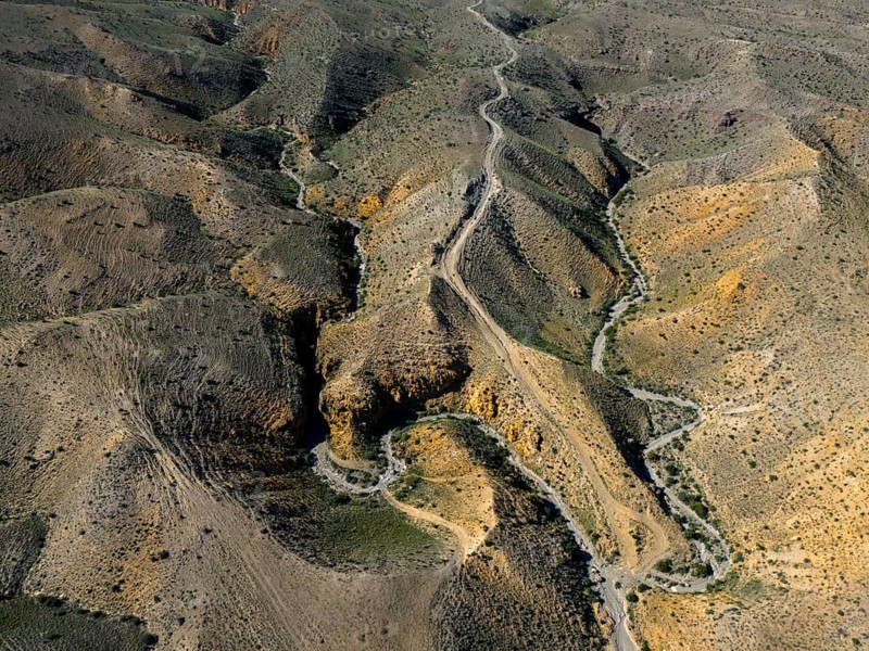 Aerial view of winding hills with a winding road through rocky landscape, aerial view, Angel's Canyon, canyon, Dashtakar, Ararat province, Armenia
