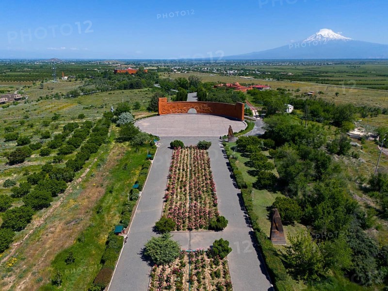 Landscape with symmetrical flower arrangements, a mountain in the background and a calm atmosphere, aerial view, Sardarapat monument, Araks village, Armavir province, in the background Mount Ararat in Turkey, Armenia