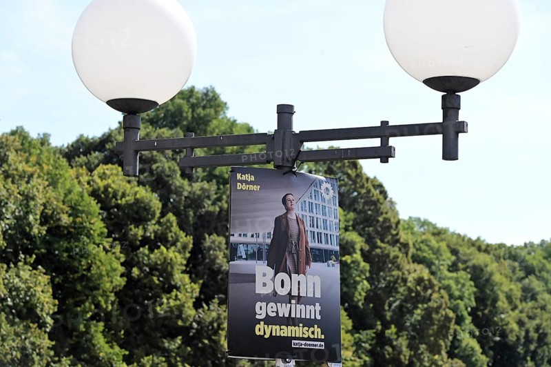 Posters for the North Rhine-Westphalia municipal election campaign in Bonn around the Hofgarten in the university district. Poster of the Green politician Katja Dörner