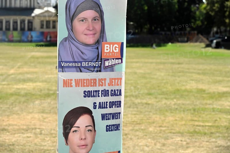 Posters for the North Rhine-Westphalia municipal election campaign in Bonn around the Hofgarten in the university district. Poster of the Stimme Bonn International (SBI) party calling for fewer refugees through fewer wars - send food instead of weapons
