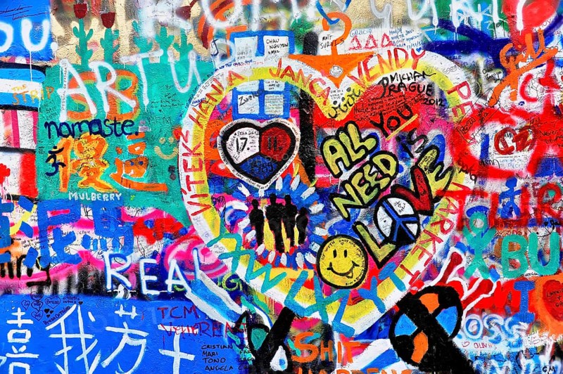 Colourful graffiti wall with heart motifs and peaceful messages, Prague, Czech Republic