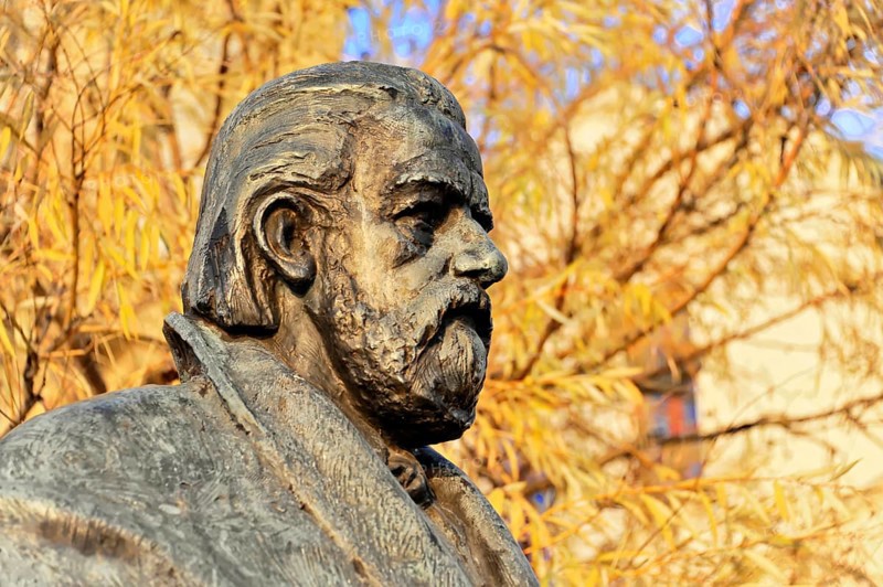 Smetana Monument, Prague, Czech Republic, Europe, Close-up of a bronze statue with autumn leaves in the background
