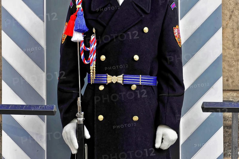 Prague, Czech Republic, Europe, Ceremonially dressed soldier in blue uniform with conspicuous belt and white gloves