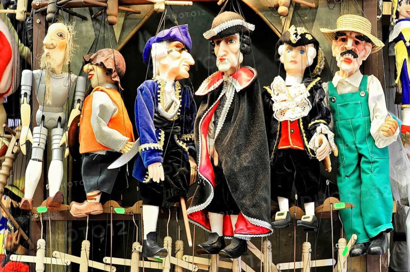 Prague puppets, Prague, Czech Republic, Europe, Differently dressed puppets lined up, colourful and lively, with historical outfits