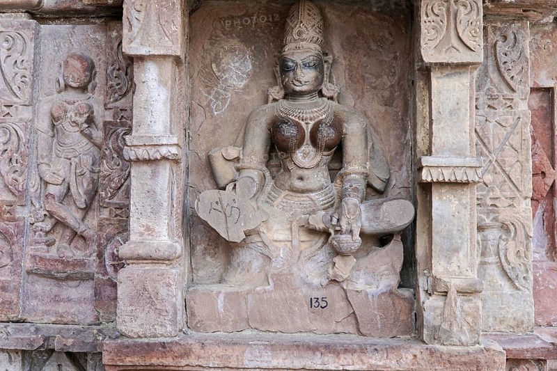 Kota, Rajasthan, North India, Asia, Stone deity in traditional pose at an Indian temple, India