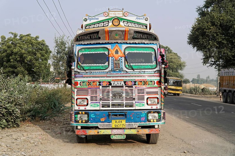 Kota, Rajasthan, North India, Asia, Decorated Indian lorry with detailed decoration on a country road, India