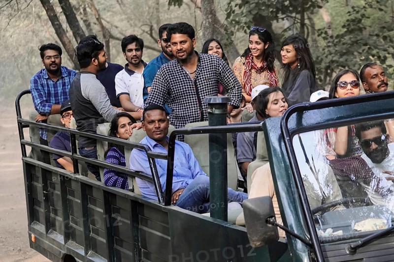 Ranthambhore Tiger Reserve, Sawai Madhopur, Kota, Rajasthan, North India, Asia, Group of people in an open vehicle on safari, India