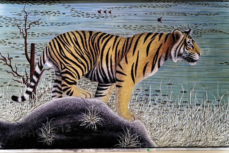 Painting, Sale, Souvenir, Udaipur, Rajasthan, India, Asia, A lifelike painting of a tiger standing on a rock by a water body, North India