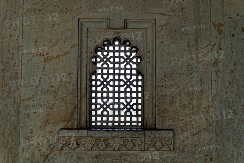 City Palace, Udaipur, Rajasthan, India, Asia, Decorated window with lattice pattern in a stone building, North India