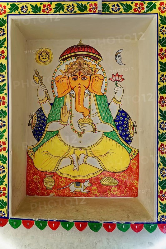 Udaipur, Rajasthan, North India, Asia, Ganesha mural in bright colours with floral details and traditional decorations