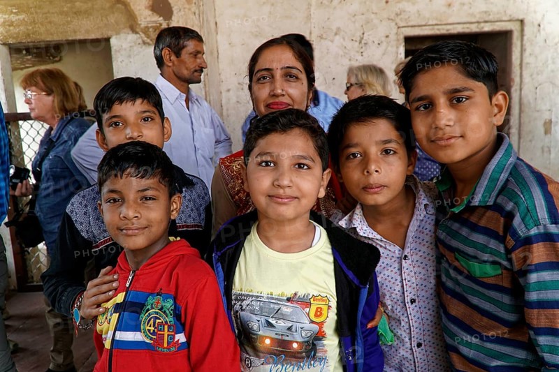 Red Fort, Agra, Uttar Pradesh, India, Group of children smiling friendly in a simple interior with a pleasant atmosphere, Jodhpur, Rajasthan, North India