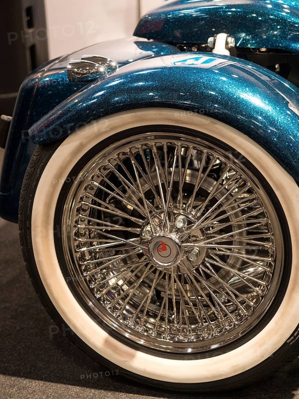 Rear tyre of a motorbike with chrome rim and retro-style wire spokes, dortmund, deutchland
