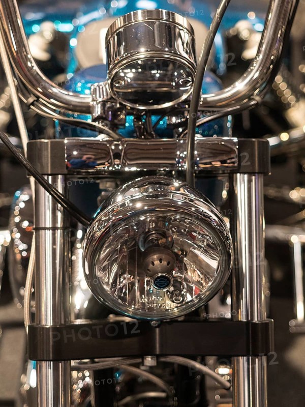 Front view of a motorbike with dominant chrome headlights, dortmund, deutchland