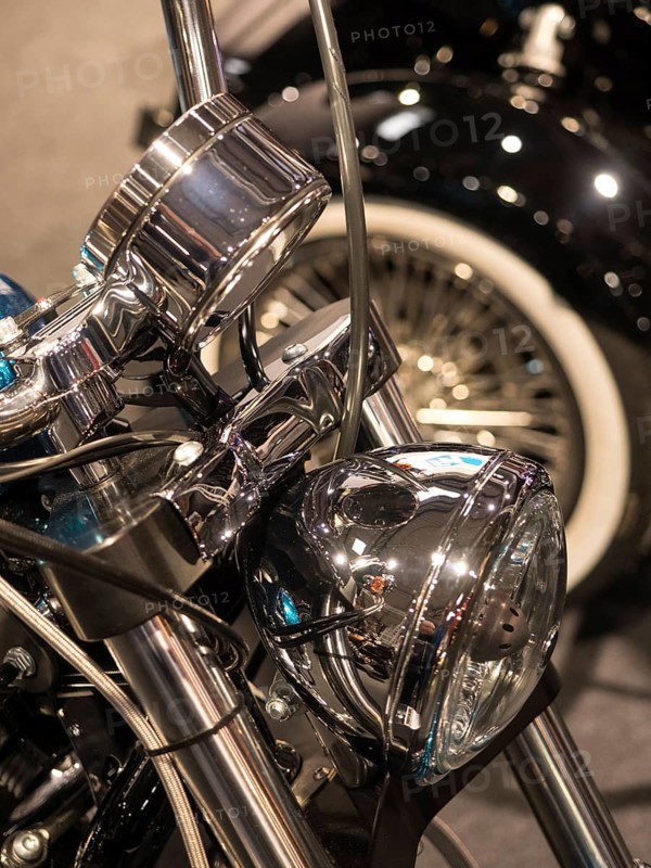 Shiny chrome headlight of a classic motorbike, dortmund, deutchland