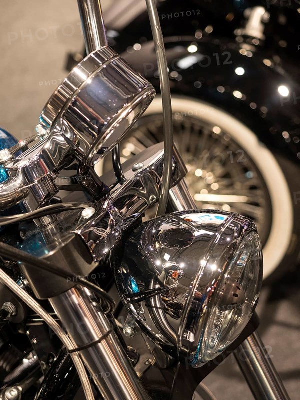 Chrome headlights with detailed wiring on a classic motorbike, dortmund, deutchland