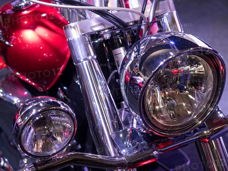 Double headlights with chrome details on a retro-style motorbike, dortmund, deutchland
