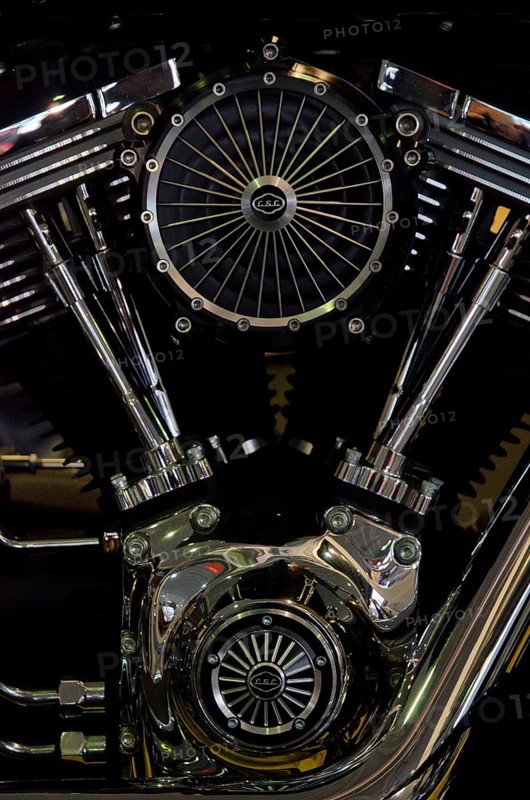 Detailed motorbike engine with accentuated shiny chrome fans and valves, dortmund, germany