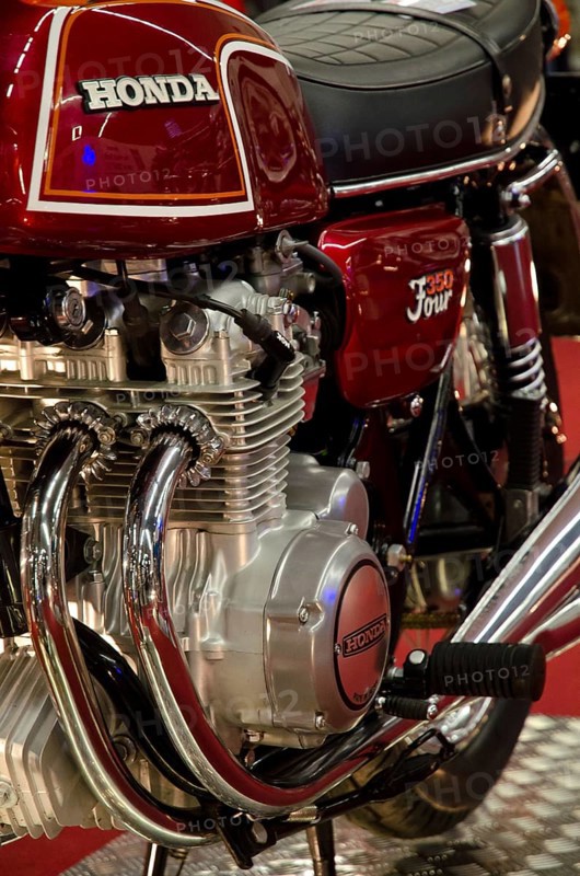 Classic red Honda motorbike with detailed view of the engine, dortmund, germany