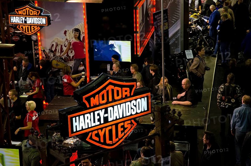 Harley-Davidson trade fair with visitors and prominent signs, dortmund, germany