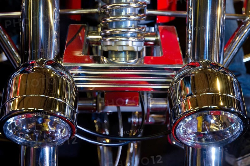 Close-up of chrome parts and headlights of a motorbike with mechanical precision, dortmund, germany