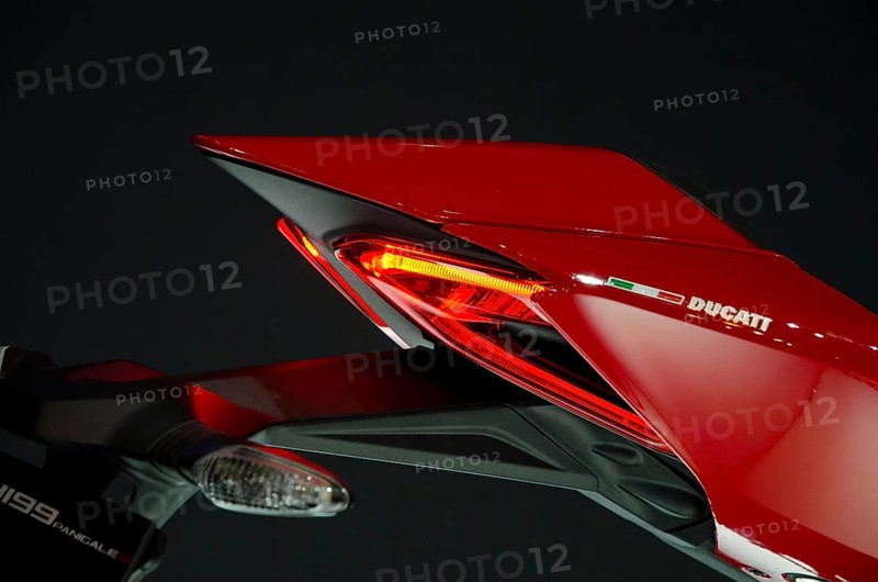 Side view of a Ducati motorbike rear end with red tail light, dortmund, germany