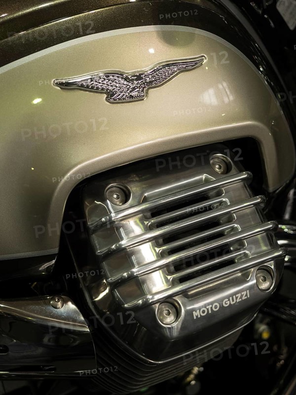 Close-up of a Moto Guzzi engine with a logo and chrome accents, dortmund, germany