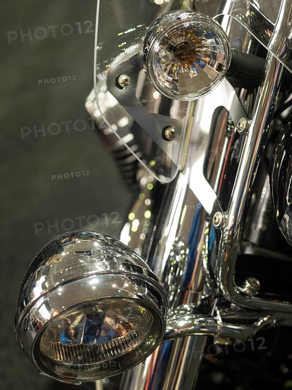 Detail of a motorbike with shiny chrome and headlight parts, dortmund, germany