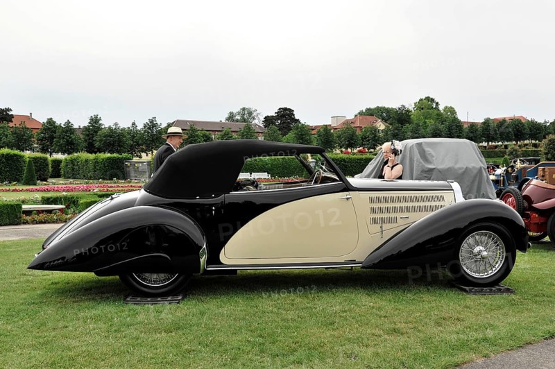 Retro Classics meets Baroque, Ludwigsburg, Baden-Württemberg, Germany, Europe Black and beige convertible on a green lawn, elegant and stylish, Europe
