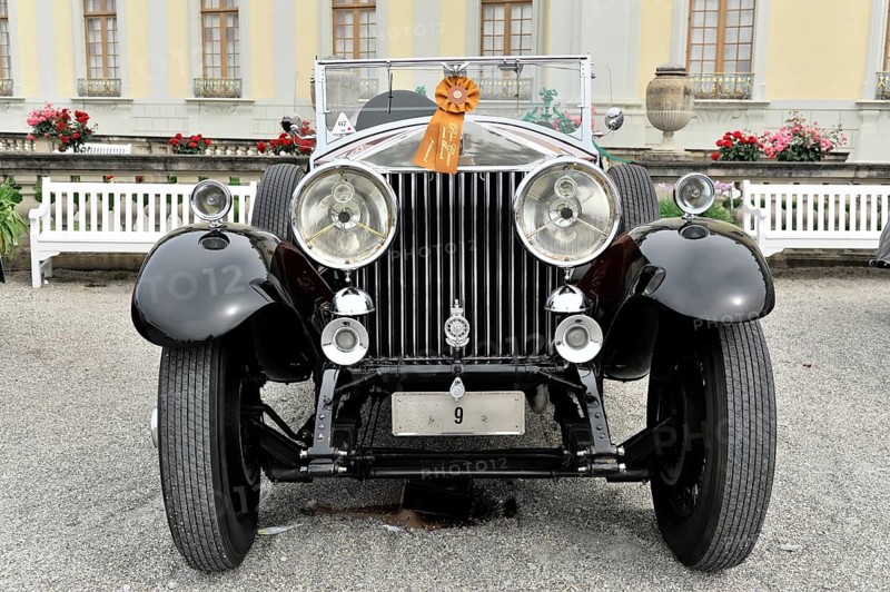 Black classic vintage car with red ribbon, elegant in front of flower bed, Retro Classics meets Baroque, Ludwigsburg, Baden-Württemberg, Germany