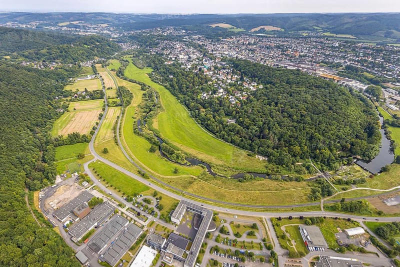 Aerial view, old town with river Ruhr Ruhrbogen at the forest area Eichholz, weir and camel bridge at the river Ruhr Ruhraue, commercial area Altes Feld, distant view, Arnsberg, Ruhr area, North Rhine-Westphalia, Germany, DE, Europe, commercial enterprises, commercial area, commercial property, commercial park, commercial location, commercial use, property tax, real estate, industrial area, industrial location, aerial view, aerial photography, aerial photography, overview, bird's-eye view, forest, forest area, residential area, housing and living, residential area, residential quality, residential neighbourhood, housing estate, residential area, birds-eyes view, overview