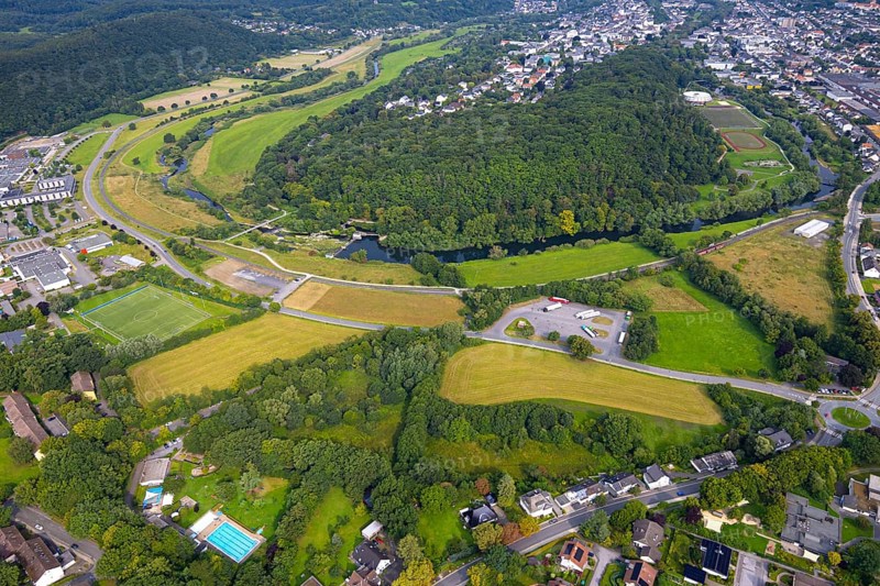 Aerial view, old town with river Ruhr Ruhrbogen at forest area Eichholz, weir and camel bridge at river Ruhr Ruhraue, truck parking, Arnsberg, Ruhr area, North Rhine-Westphalia, Germany, DE, Europe, property tax, real estate, aerial view, aerial photography, aerial photography, overview, bird's eye view, forest, forest area, residential area, housing and living, residential area, quality of living, residential area, housing estate, residential district, birds-eyes view, overview