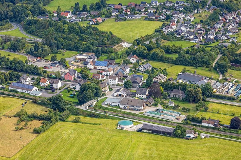 Aerial view, residential area Casparistraße and Im Ruhrbruch, railway line, small chapel and church St. Joseph Kapelle Uentrop, Uentrop, Arnsberg, Ruhr area, North Rhine-Westphalia, Germany, place of worship, DE, Europe, religious community, place of worship, holy place, church, parish, denomination, aerial view, aerial photography, aerial photography, religion, religious site, overview, bird's-eye view, overview