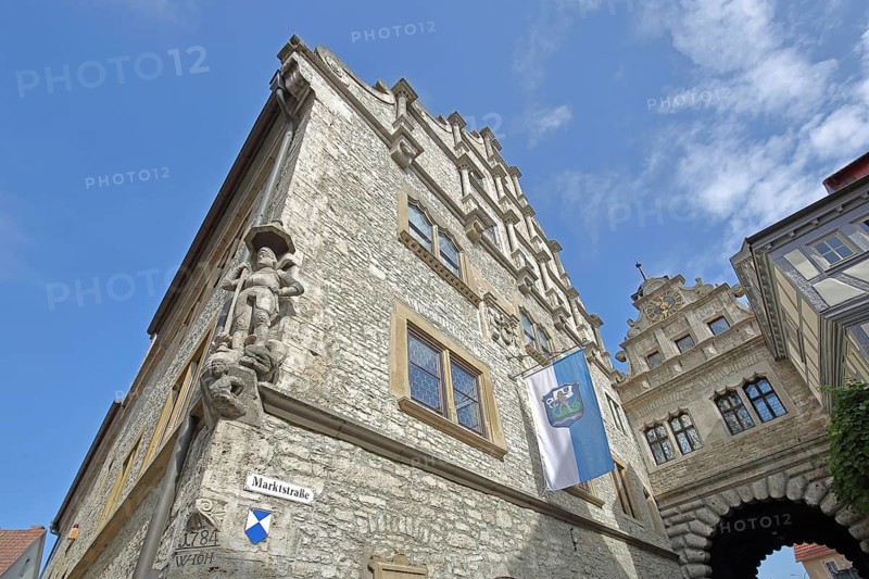Renaissance town hall built in 1581 with statue of St George and Main Gate, town flag, town gate, town tower, Marktbreit, Lower Franconia, Franconia, Bavaria, Germany