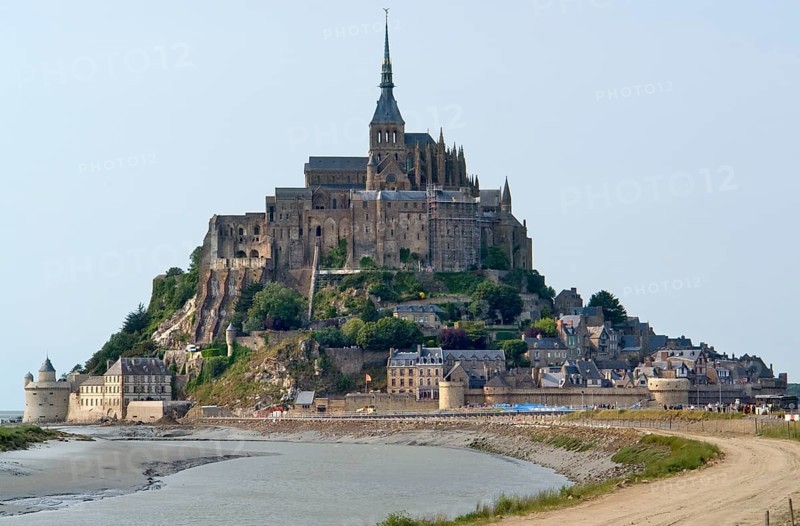 The Mont Saint Michel Abbey in Lower Normandy France at evening time