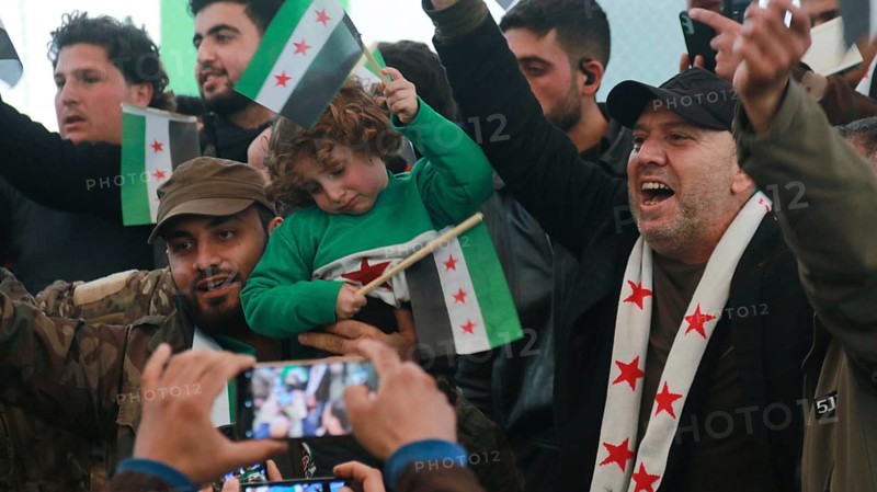 Syrians are seen demonstrating against the rule of Bashar al-Assad while carrying banners and the Syrian revolutionary flag during anti-government protests. Aleppo, Syria. July 30, 2016, Aleppo, Azaz, Syria