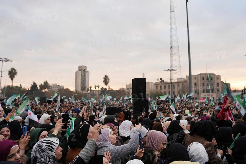 Thousands of Syrians take to public squares and main streets waving the revolutionary flag and chanting slogans to mark the downfall of Bashar al-Assad's regime and his escape to Russia. Aleppo, Syria. December 21, 2024, Aleppo, Aleppo, Syria