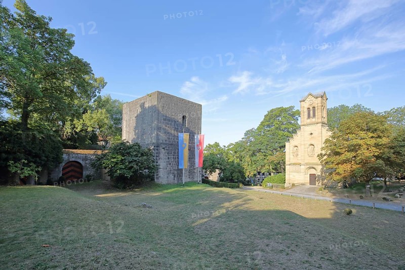 Inner courtyard with St Boniface's Chapel built in the 11th century and town flag, Salzburg Castle, Bad Neustadt an der Saale, Rhön, Lower Franconia, Franconia, Bavaria, Germany