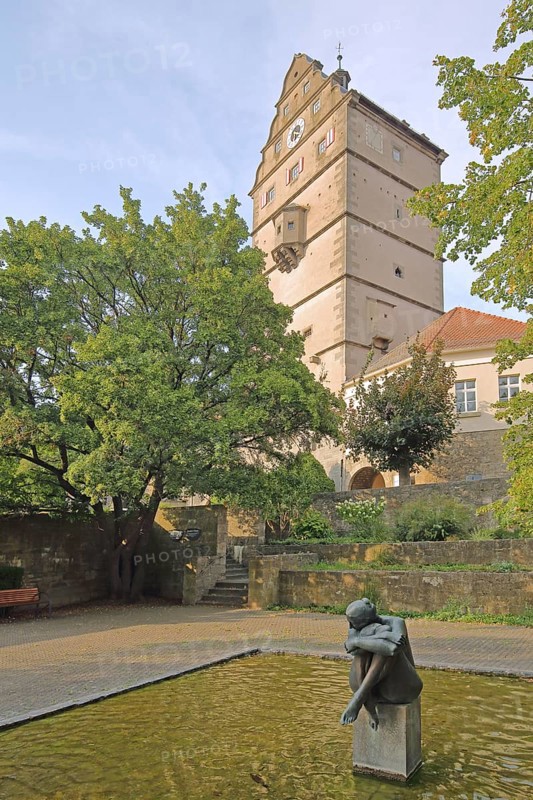 Pershore Park with spring nymph by Wilhelm Uhlig, modern art, seated nymph in the water, town gate built in 1580, landmark, Hohntor, Bad Neustadt an der Saale, Rhön, Lower Franconia, Franconia, Bavaria, Germany