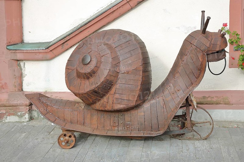 Snail figure from the Clemens company 2008, artwork, rusty steel sculpture, forging, handicraft, modern art, market square, town hall, Volkach, Lower Franconia, Franconia, Bavaria, Germany