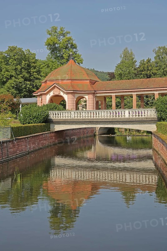 Wernarz spring temple built in 1911 and bridge over the river Sinn, temple, art nouveau, reflection, foyer, state bath, Bad Brückenau, Rhön, Bavaria, Germany