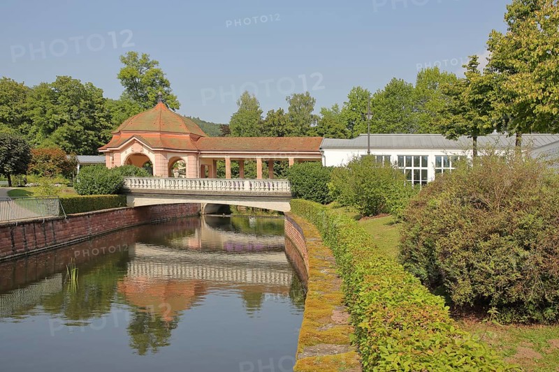 Wernarz spring temple built in 1911 and bridge over the river Sinn, temple, art nouveau, reflection, foyer, spa gardens, state bath, Bad Brückenau, Rhön, Bavaria, Germany