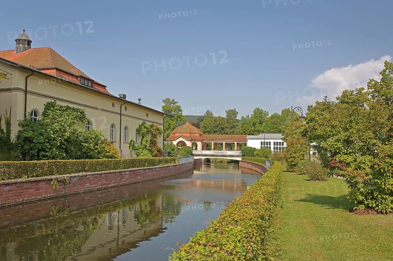 Wernarz spring temple built in 1911 and bridge over the river Sinn, temple, art nouveau, reflection, foyer, spa gardens, state bath, Bad Brückenau, Rhön, Bavaria, Germany